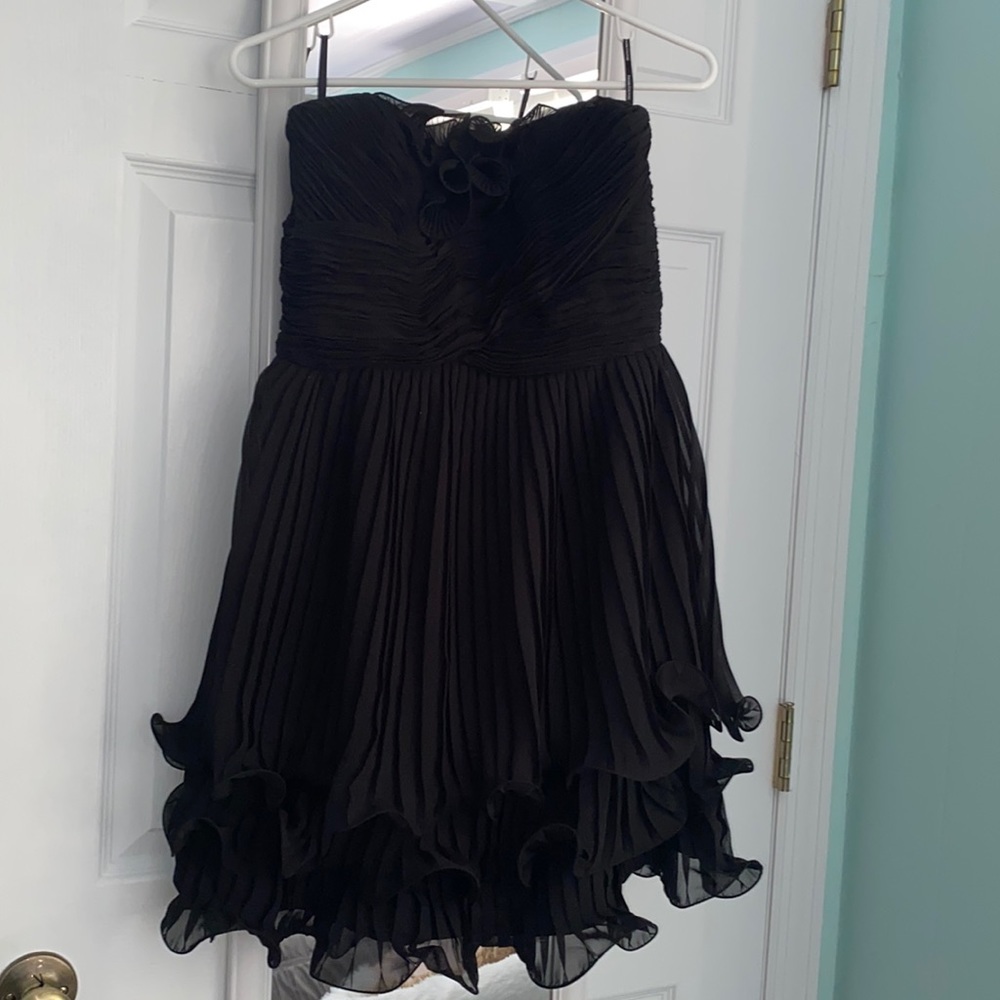Go all out black frilly dress